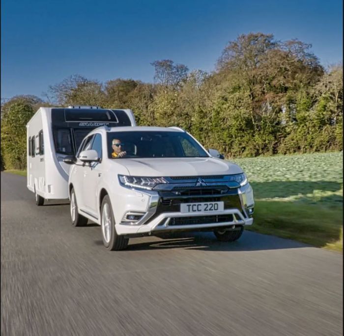 How far can a hybrid truck tow?