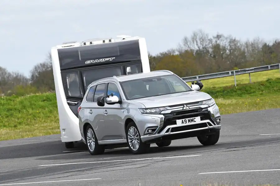 How far can a hybrid truck tow?